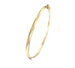 Твърда златна гривна Wave